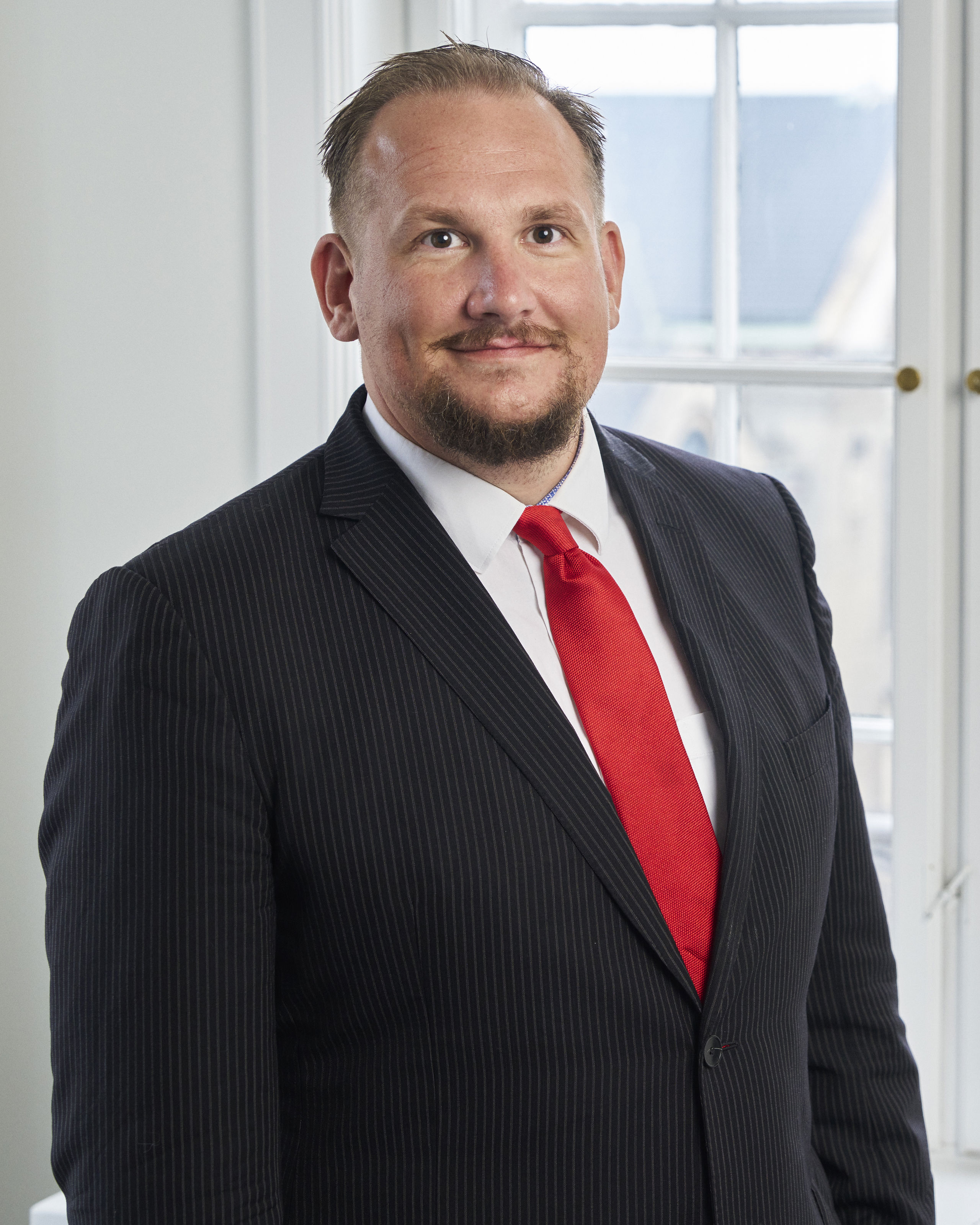 Portrait of teacher on Niels Brock Copenhagen Business College Andreas Munch