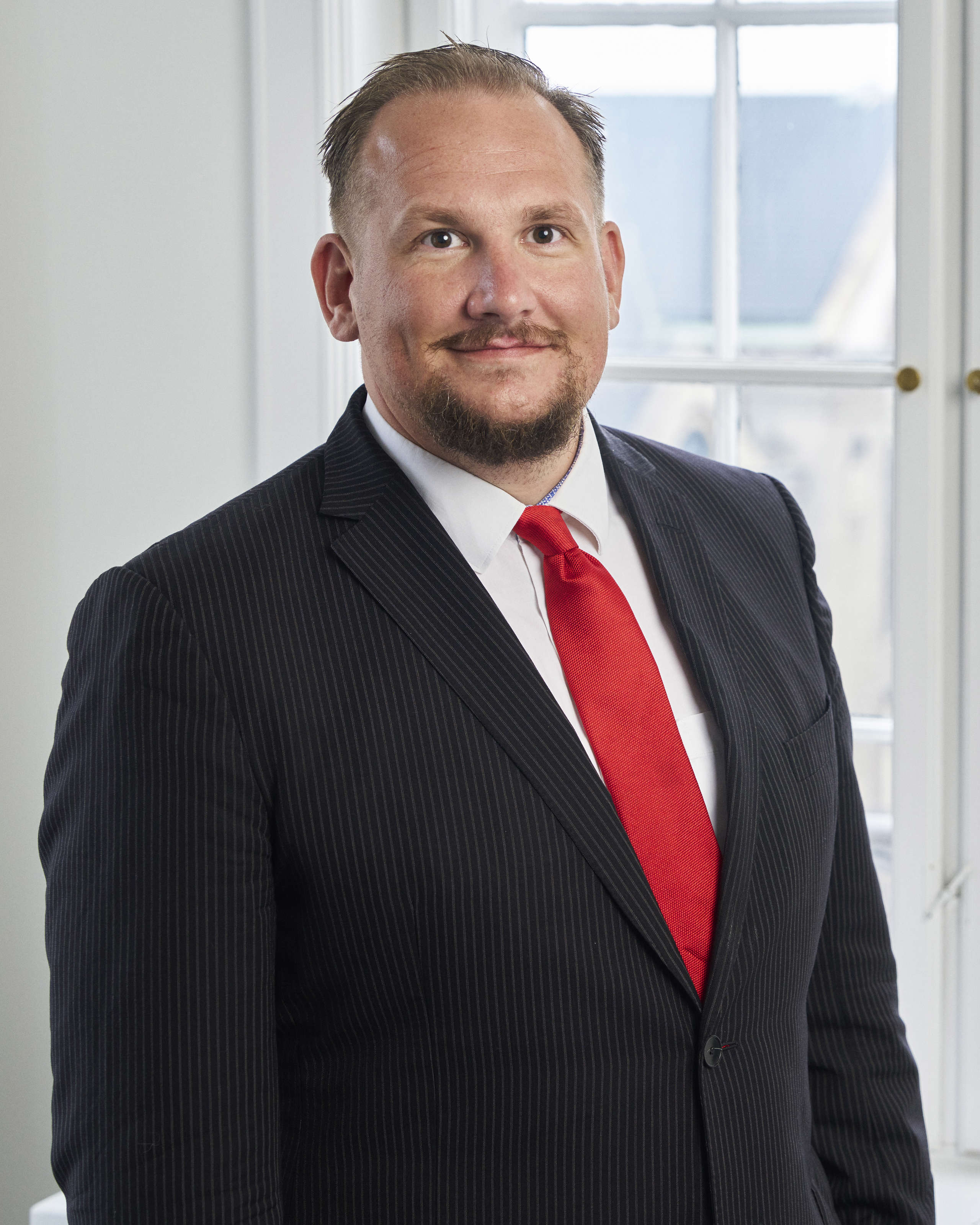 Portrait of teacher on Niels Brock Copenhagen Business College Andreas Munch