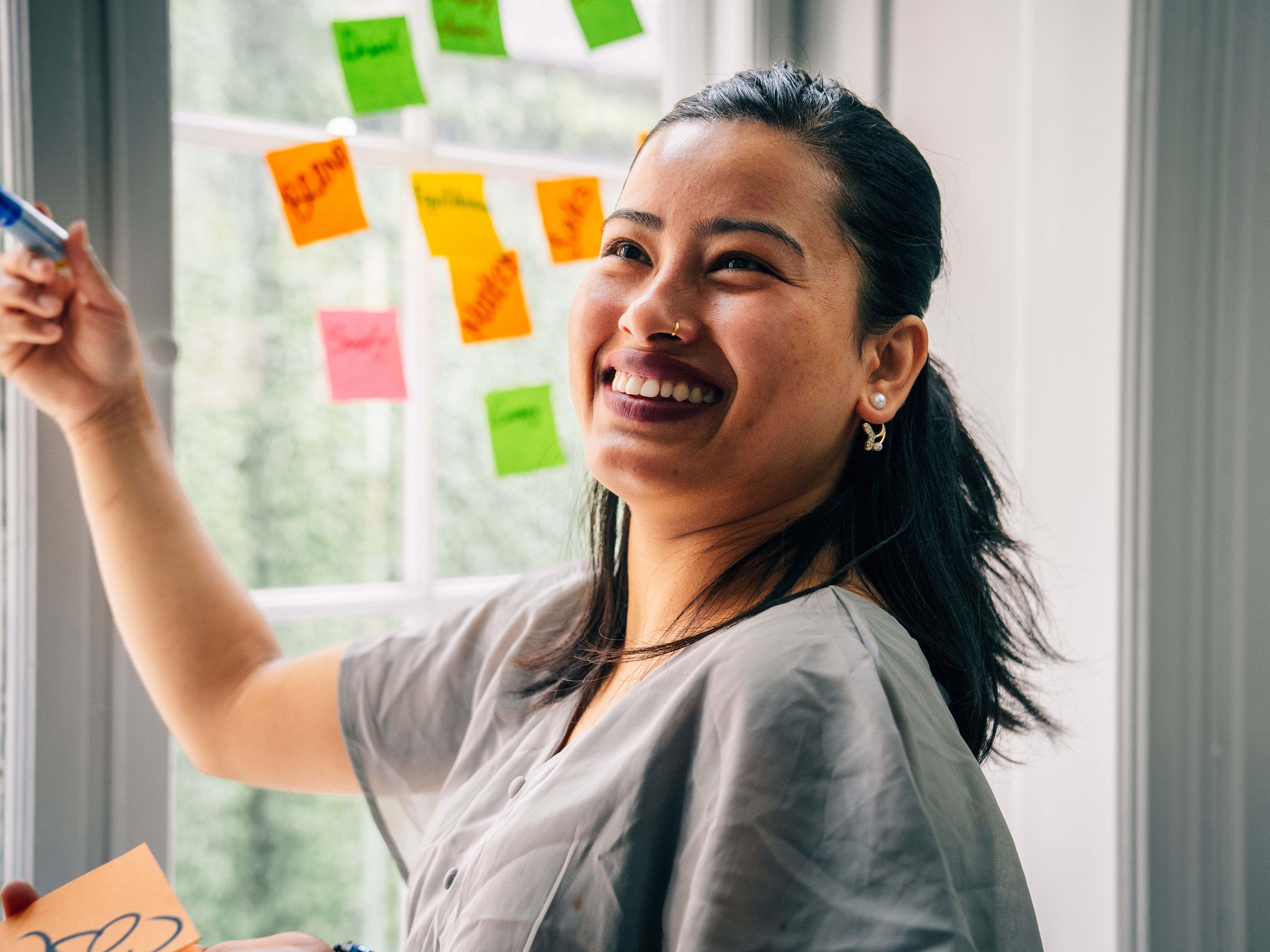 A student from Niels Brock Copenhagen Business College smiling