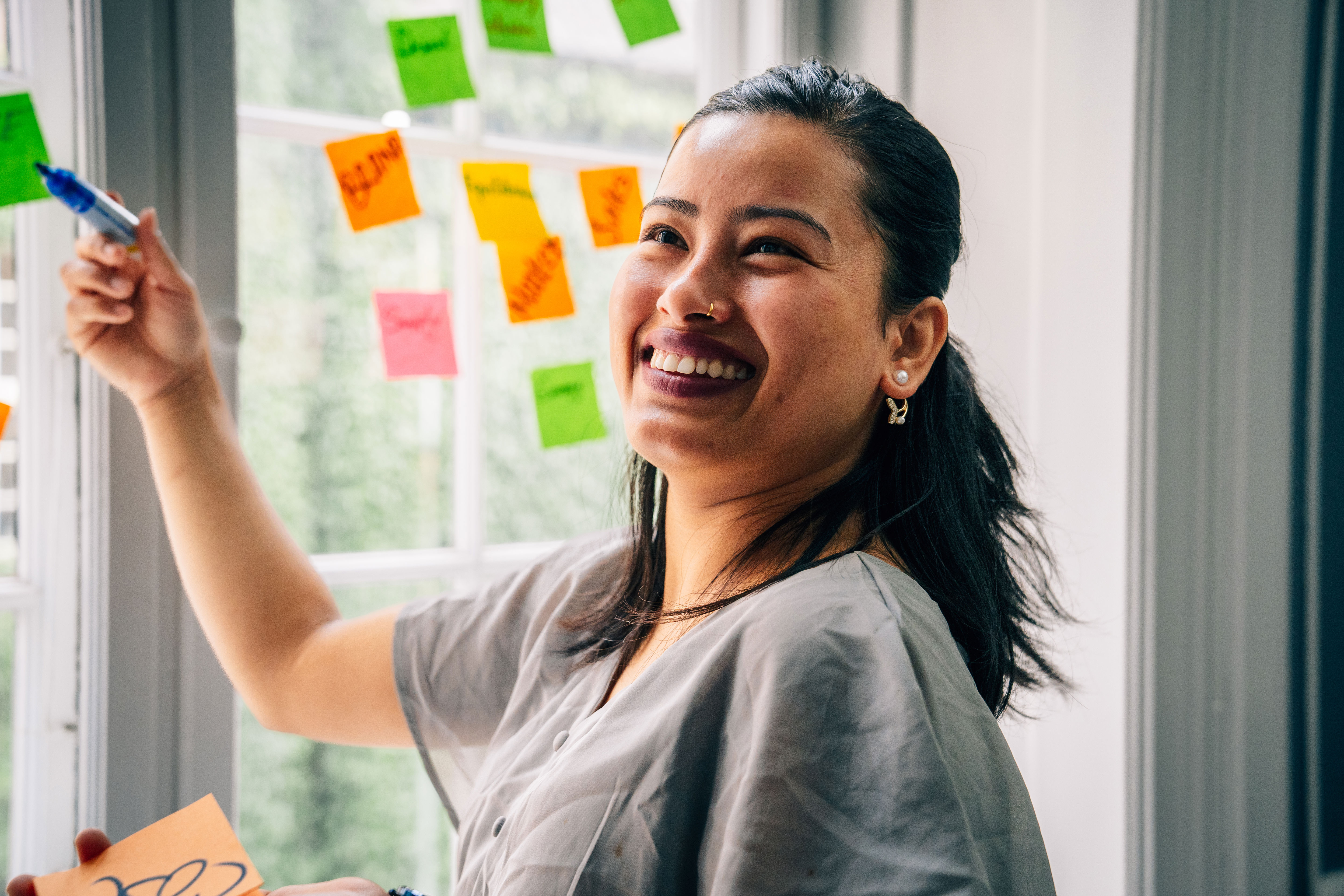 A student from Niels Brock Copenhagen Business College smiling